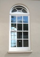 Windows sliding-sash-window-with-arched-fanlight-opening